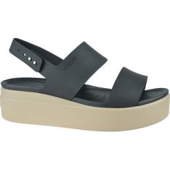 Crocs Brooklyn Low Wedge 206453-07H sandały sportowe damskie czarne 36/37. Czarne klapki damskie Crocs, bez wzorów, ze skóry, na niskim obcasie, na platformie. W wyprzedaży za 219,99 zł.