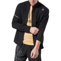 Reebok Run Essentials Woven Jacket DU4303. Czarne kurtki męskie Reebok, xxl, bez wzorów, z poliesteru, bez kaptura. W wyprzedaży za 159,99 zł.