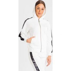 BLUZA twinset. Białe bluzy damskie Twinset, bez wzorów, bez rękawów, bez kaptura. Za 759,00 zł.