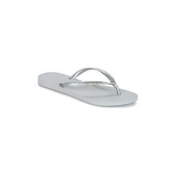 Japonki Havaianas SLIM LOGO METALLIC. Szare klapki damskie Havaianas, bez wzorów, bez obcasa. Za 90,30 zł.