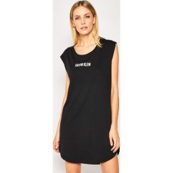 Sukienka plażowa Calvin Klein Swimwear Intense Power KW0KW01008. Czarne sukienki damskie Calvin Klein Swimwear, na plażę, s, bez wzorów, z bawełny, bez kołnierzyka, bez rękawów. Za 269,00 zł.