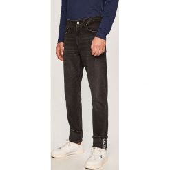 Calvin Klein Jeans - Jeansy. Czarne jeansy męskie Calvin Klein Jeans, z aplikacjami. Za 539,90 zł.