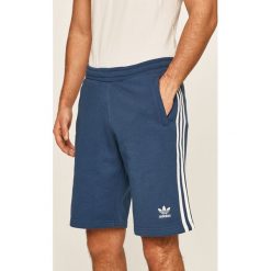 Adidas Originals - Szorty. Niebieskie spodenki sportowe męskie adidas Originals, s, bez wzorów, z bawełny, sportowe. Za 149,90 zł.