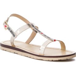 Sandały LOVE MOSCHINO - JA16421G07JV210A Bia/Spe.Plat. Żółte klapki damskie Love Moschino, bez wzorów, ze skóry, bez obcasa. W wyprzedaży za 309,00 zł.