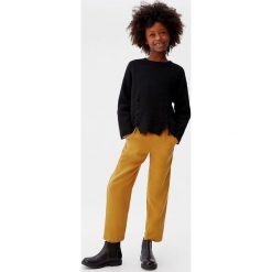 Mango Kids - Spodnie dziecięce Fruit 110-164 cm. Żółte spodnie dziewczęce Mango Kids, bez wzorów, z lyocellu. Za 89,90 zł.