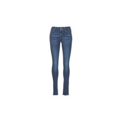 Jeansy skinny Levis 721 HIGH RISE SKINNY. Niebieskie rurki damskie marki Levi's®, z jeansu. Za 343,20 zł.