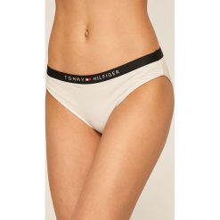 Tommy Hilfiger - Figi kąpielowe. Żółte stroje kąpielowe damskie TOMMY HILFIGER, s, z aplikacjami, z elastanu. W wyprzedaży za 99,90 zł.