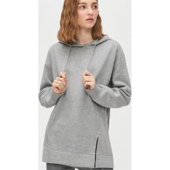 Bluza oversize z rozcięciem - Jasny szary. Szare bluzy damskie Cropp, s, bez wzorów, bez rękawów, bez kaptura. Za 89,99 zł.