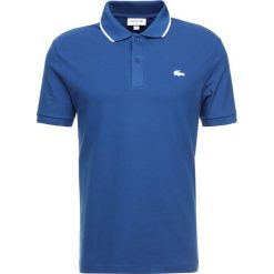 Lacoste Koszulka polo electrique/blanc. Zielone koszulki męskie Lacoste, xs, bez wzorów, z elastanu, polo, bez rękawów. Za 459,00 zł.