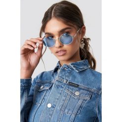 NA-KD Accessories Owalne kolorowe okulary przeciwsłoneczne - Blue. Niebieskie okulary przeciwsłoneczne damskie aviatory NA-KD Accessories, owalne. Za 40,95 zł.