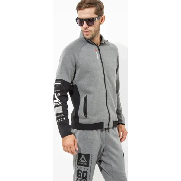 Reebok Bluza Os Quik Trk Jkt , szary, rozmiar M. Szare bluzy męskie Reebok, m, bez wzorów, z bawełny, sportowe, bez kołnierzyka, bez rękawów, bez kaptura. W wyprzedaży za 179,99 zł.