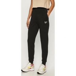 Reebok Classic - Spodnie. Czarne spodnie damskie Reebok Classic, s, bez wzorów, z bawełny. Za 179,90 zł.
