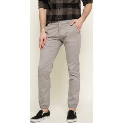 Dickies - Spodnie. Szare spodnie męskie marki Dickies, na co dzień, bez wzorów, z elastanu, casualowe. W wyprzedaży za 149,90 zł.