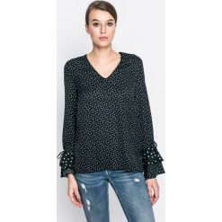 Vero Moda - Bluzka. Czarne bluzki damskie Vero Moda, na co dzień, s, bez wzorów, z poliesteru, casualowe, bez kołnierzyka, bez rękawów. W wyprzedaży za 39,90 zł.