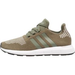 Adidas Originals SWIFT RUN Tenisówki i Trampki base green/core black. Zielone tenisówki damskie adidas Originals, z materiału. W wyprzedaży za 359,10 zł.