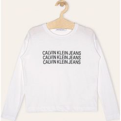 Calvin Klein Jeans - Longsleeve dziecięcy 128-176 cm. Szare bluzki dziewczęce Calvin Klein Jeans, z nadrukiem, z bawełny, z okrągłym kołnierzem, z długim rękawem, długie, bez kaptura. Za 129,90 zł.