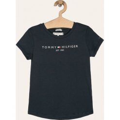 Tommy Hilfiger - T-shirt dziecięcy 74-176 cm. Różowe bluzki dziewczęce TOMMY HILFIGER, bez wzorów, z bawełny, z okrągłym kołnierzem, z krótkim rękawem, krótkie, bez kaptura. Za 89,90 zł.