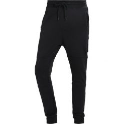 Spodnie dresowe męskie: Jack & Jones JCOSHAUN PANTS Spodnie treningowe black