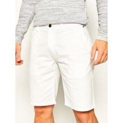 Szorty materiałowe Tommy Jeans Tjm Dobby Chino DM0DM07940. Niebieskie spodenki i szorty męskie Tommy Jeans, m, bez wzorów, z elastanu. Za 339,00 zł.