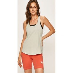 Under Armour - T-shirt. Zielone topy damskie Under Armour, s, bez wzorów, z bawełny, z okrągłym kołnierzem. W wyprzedaży za 49,90 zł.
