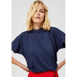 Bluzka z wiązaniem na plecach. Niebieskie bluzki damskie Moodo, m, bez wzorów, z bawełny, ze stójką, z krótkim rękawem. Za 19,99 zł.