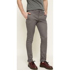 Dickies - Spodnie. Szare spodnie męskie Dickies, na co dzień, bez wzorów, z elastanu, casualowe. W wyprzedaży za 99,90 zł.