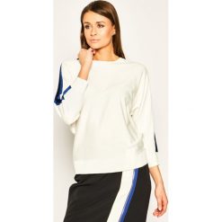 Sweter DKNY P0AS8885. Białe swetry damskie DKNY, s, bez wzorów, klasyczne, bez rękawów, bez kaptura. Za 389,00 zł.