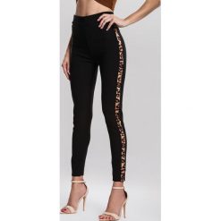 Czarne Legginsy Demonstrable. Czarne legginsy damskie Renee, s, z aplikacjami. Za 39,99 zł.