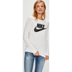 Nike Sportswear - Bluzka. Białe bluzki damskie Nike Sportswear, na co dzień, s, z nadrukiem, z poliesteru, z okrągłym kołnierzem, bez rękawów. W wyprzedaży za 139,90 zł.