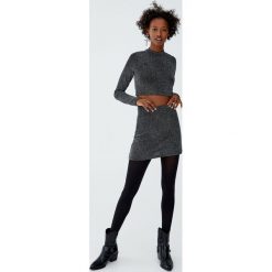 Błyszcząca minispódniczka. Czarne spódniczki damskie Pull&Bear, bez wzorów. Za 49,90 zł.