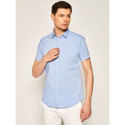 Koszula Emporio Armani 8N1C10 1N06Z F708. Niebieskie koszule męskie Emporio Armani, m, bez wzorów, z elastanu, casualowe, bez kołnierzyka, bez rękawów. W wyprzedaży za 359,00 zł.