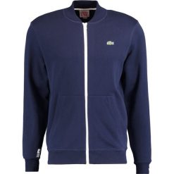 Lacoste LIVE Bluza rozpinana marine. Niebieskie bluzy męskie rozpinane marki Lacoste LIVE, xs, z bawełny. Za 439,00 zł.