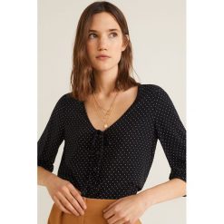 Mango - Bluzka Carrie. Szare bluzki damskie marki Mango, s, bez wzorów, z wiskozy, casualowe, z okrągłym kołnierzem, bez rękawów. Za 89,90 zł.