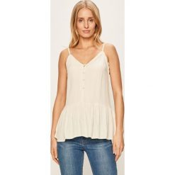 Vero Moda - Bluzka. Białe bluzki damskie Vero Moda, s, bez wzorów, z wiskozy, bez kołnierzyka, bez rękawów. Za 119,90 zł.