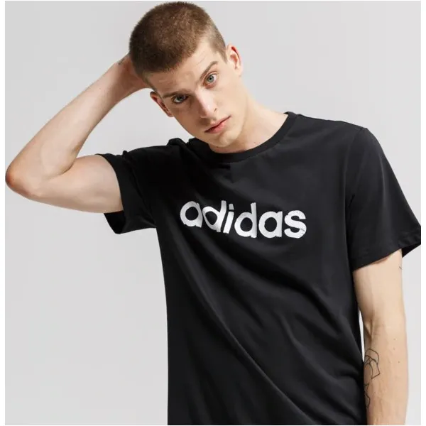 Adidas Koszulka Ss M Grfx Lnr T 3 , czarny, rozmiar L. Czarne koszulki męskie Adidas, m, bez wzorów, z bawełny, bez kołnierzyka, bez rękawów. Za 79,99 zł.