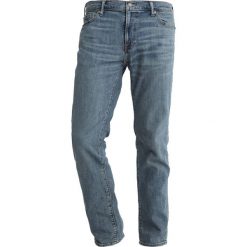 Abercrombie & Fitch Jeansy Slim Fit medium wash. Niebieskie jeansy męskie relaxed fit marki Abercrombie & Fitch. Za 369,00 zł.