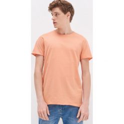 T-shirt z bawełny organicznej - Pomarańczowy. Pomarańczowe t-shirty męskie House, s, bez wzorów, z bawełny, bez kołnierzyka. W wyprzedaży za 29,99 zł.