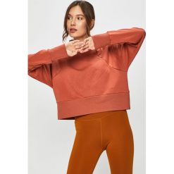 Nike - Bluza. Pomarańczowe bluzy damskie Nike, s, bez wzorów, z elastanu, bez rękawów, bez kaptura. W wyprzedaży za 179,90 zł.