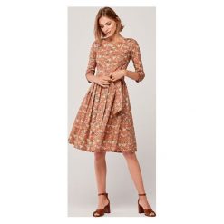 Sukienka Melia Dolce brązowa 44 brązowy. Pomarańczowe sukienki damskie s, z elastanu, eleganckie, rozkloszowane. Za 547,00 zł.