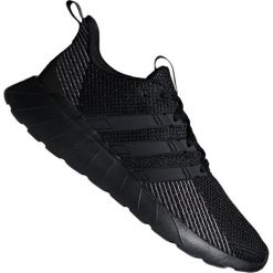 Czarne Buty biegowe adidas Questar Flow M F36255. Czarne buty sportowe męskie Adidas, na wiosnę, z tkaniny, z paskami, do biegania. W wyprzedaży za 289,00 zł.