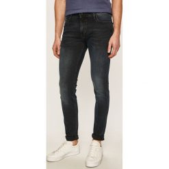 Jack & Jones - Jeansy Liam. Niebieskie jeansy męskie Jack & Jones, z aplikacjami. Za 169,90 zł.