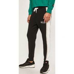 Nike Sportswear - Spodnie. Czarne spodnie męskie Nike Sportswear, na co dzień, m, bez wzorów, z elastanu, casualowe. Za 259,90 zł.