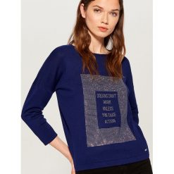 Sweter z aplikacją - Niebieski. Niebieskie swetry damskie Mohito, s, z aplikacjami, bez rękawów, bez kaptura. W wyprzedaży za 39,99 zł.