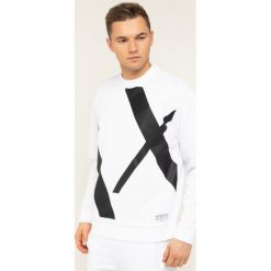 Bluza Armani Exchange 3HZMFD ZJ1NZ 7127. Białe bluzy męskie Armani Exchange, xl, bez wzorów, z bawełny, bez kołnierzyka, bez rękawów, bez kaptura. Za 469,00 zł.