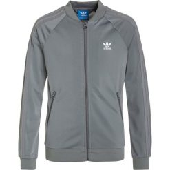 Adidas Originals SUPERGIRL Kurtka sportowa grey three/white. Szare kurtki chłopięce marki adidas Originals, z materiału. W wyprzedaży za 159,20 zł.