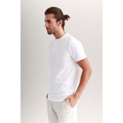 Koszulka w kolorze białym. Białe koszulki męskie TATUUM, xxl, bez wzorów, z bawełny, polo, bez rękawów. W wyprzedaży za 59,95 zł.