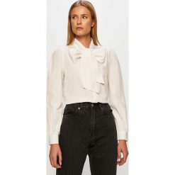 Only - Koszula bawełniana. Czarne bluzki damskie ONLY, na co dzień, bez wzorów, z bawełny, casualowe, bez kołnierzyka, z długim rękawem. Za 129,90 zł.