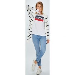 Levi's - Top The Perfect Tee Sportswear. Białe bluzki damskie marki Levi's®, l, z nadrukiem, z bawełny, casualowe, z okrągłym kołnierzem, z krótkim rękawem. W wyprzedaży za 84,90 zł.