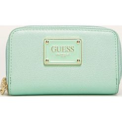 Guess Jeans - Portfel. Różowe portfele damskie Guess Jeans, z aplikacjami, z jeansu. Za 139,90 zł.