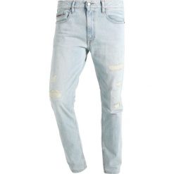 Calvin Klein Jeans Jeansy Slim Fit berlin blue. Niebieskie jeansy męskie relaxed fit marki Calvin Klein Jeans. W wyprzedaży za 519,20 zł.